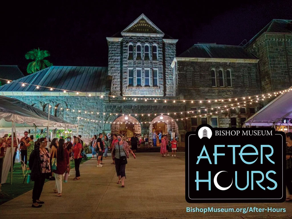 Hawaiian Hall at the Bishop Museum illuminated at night for Bishop Museum After Hours